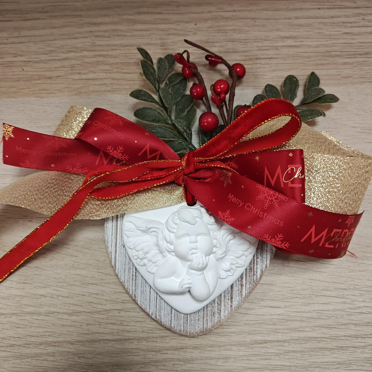 Angioletto in gesso da appendere