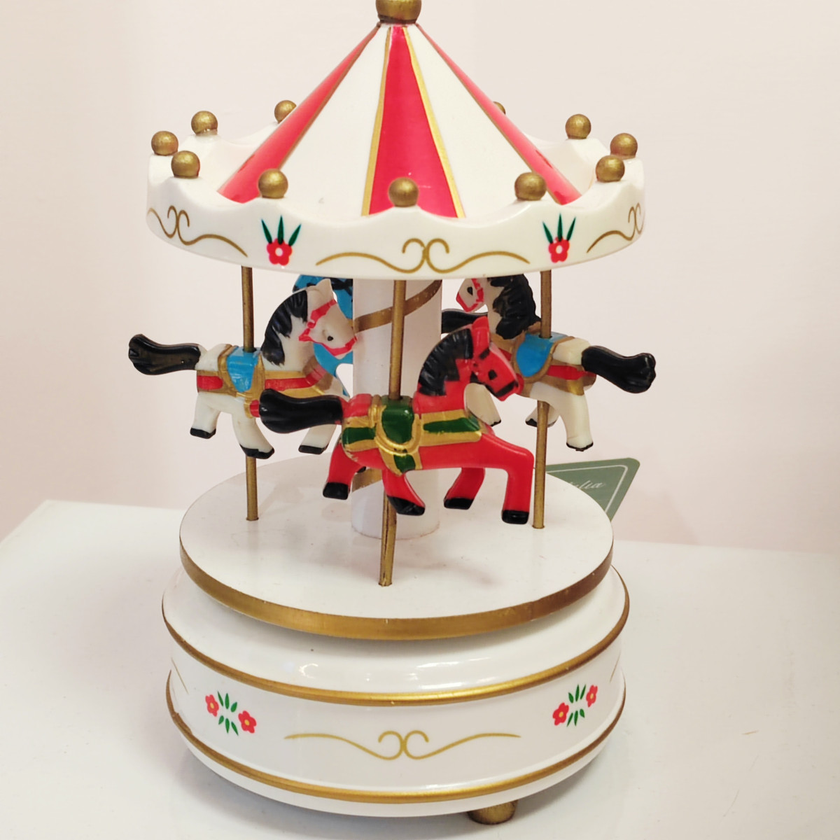 Carillon meccanico rosso con cavallucci