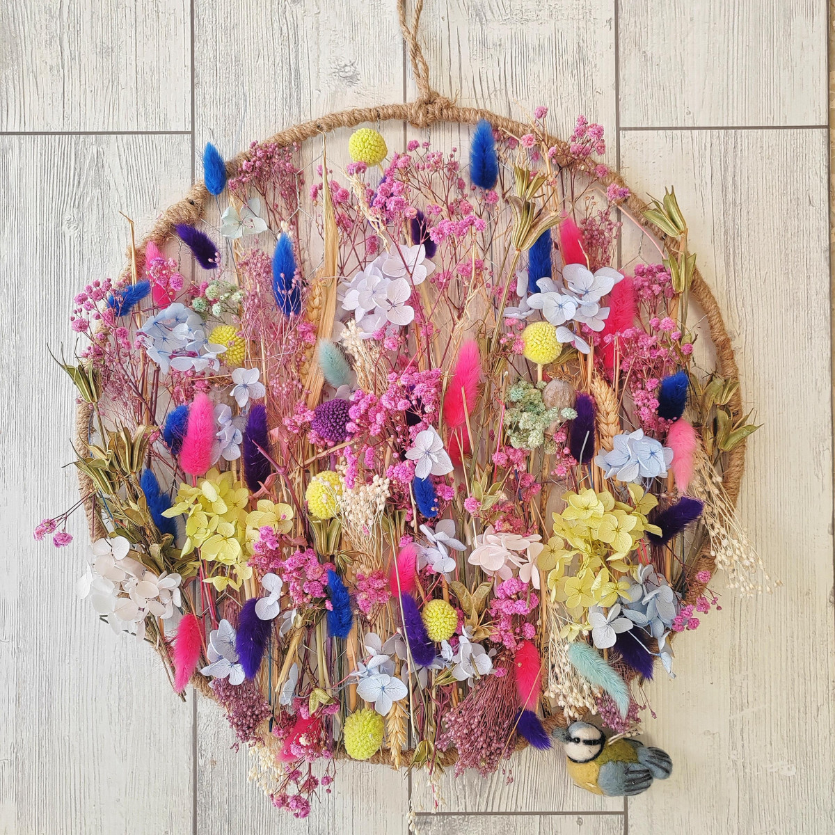 Cerchio in corda con fiori preservati e uccellino Gry & Sif