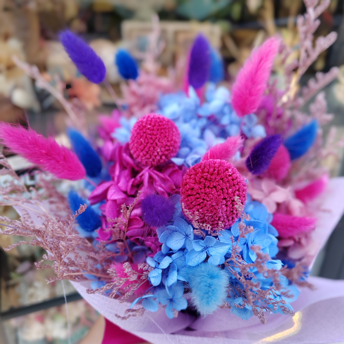 Mazzettino brioso blu e magenta